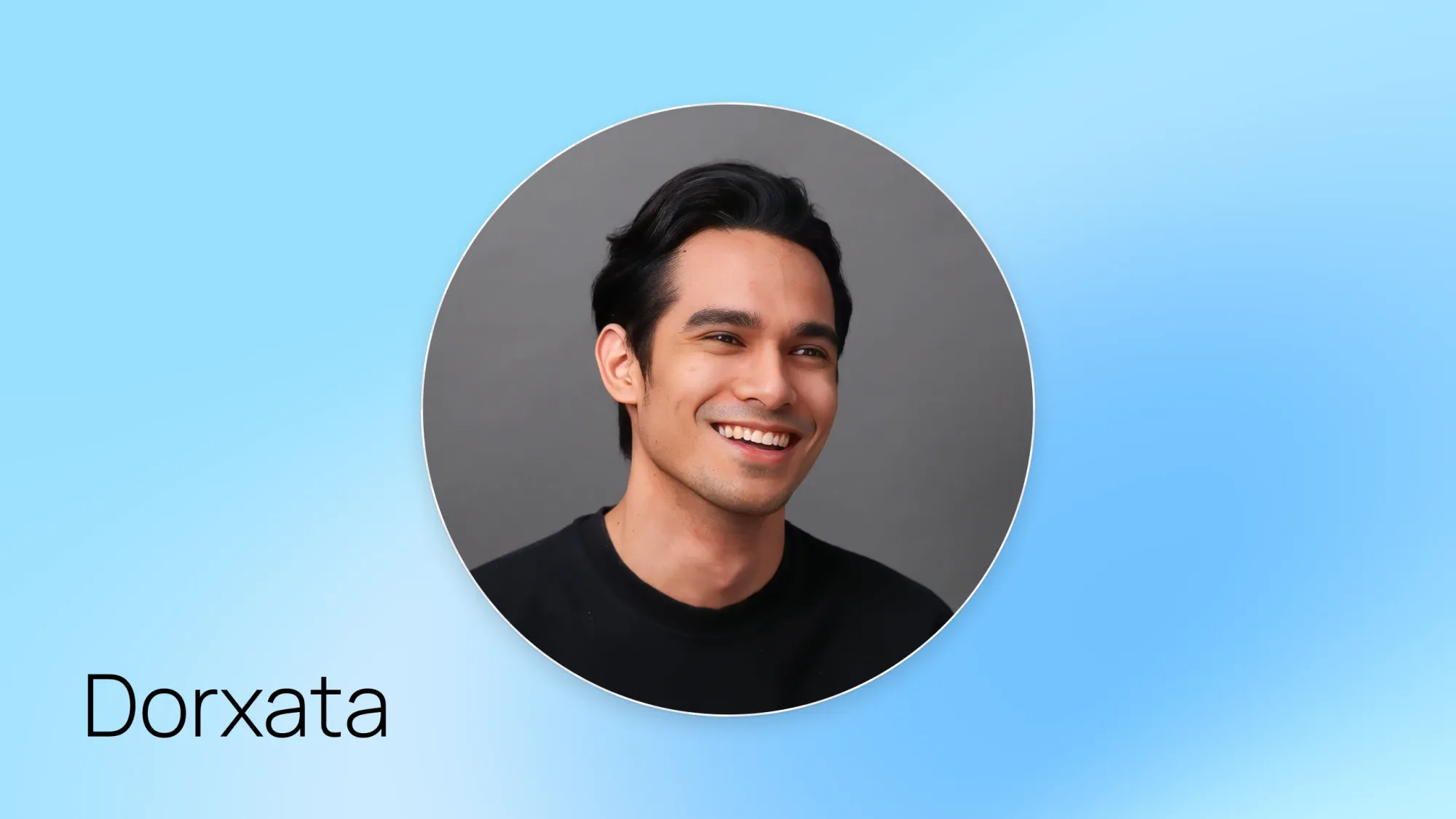 Smiling man headshot in black shirt on gray background, with name Dorxata on blue gradient backdrop