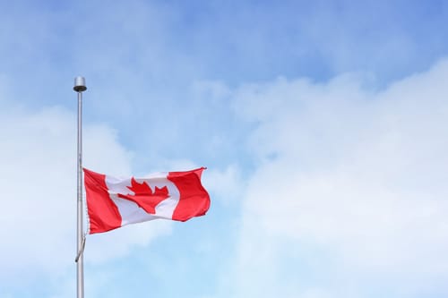 Canadian flag at half mast.