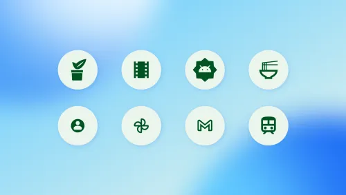 Android app icon grid on blue background with plant, film strip, Android badge, ramen, user, clover, M logo, and train symbols